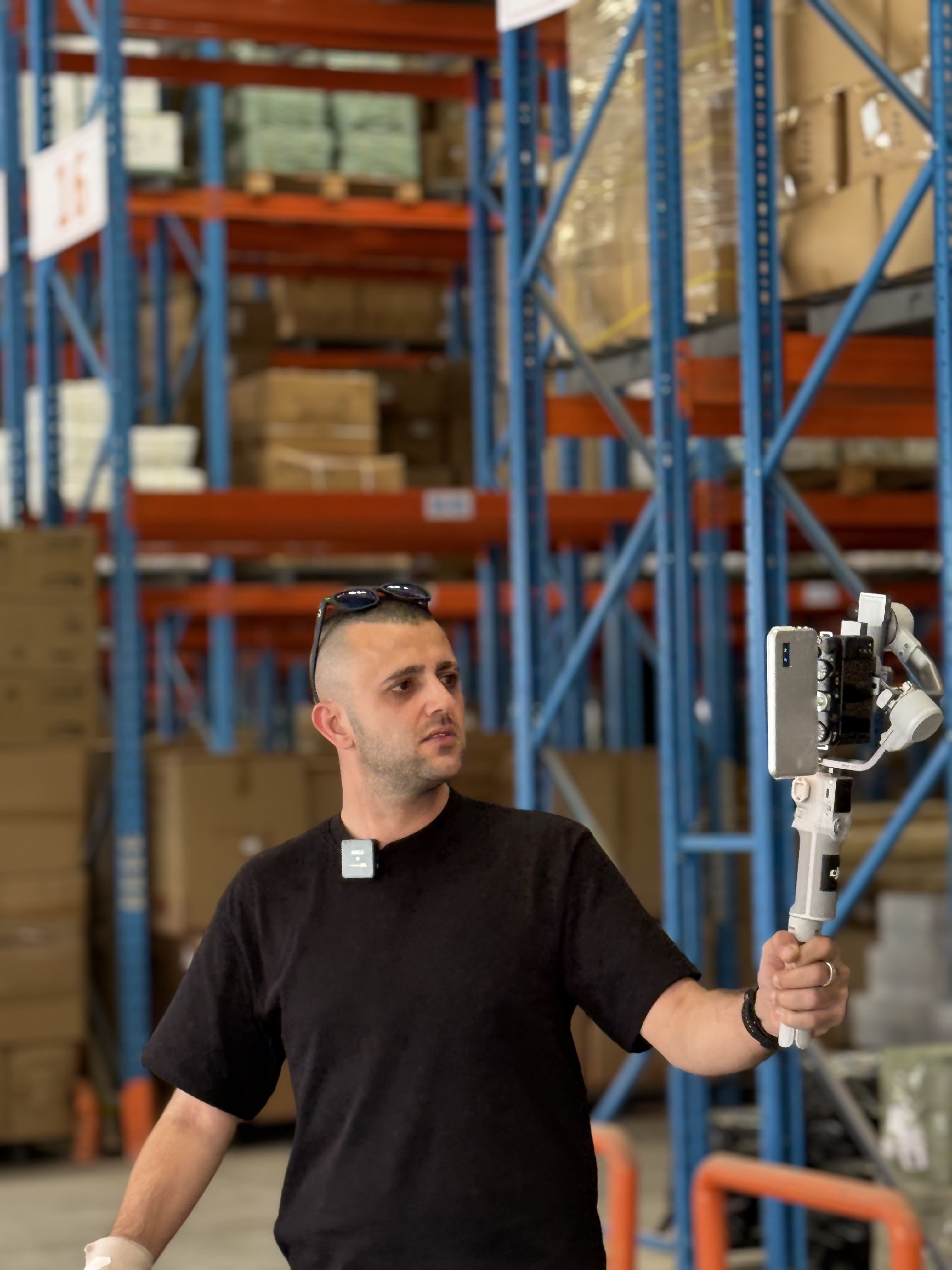 Salam Ahmad Jawhar inside a warehouse